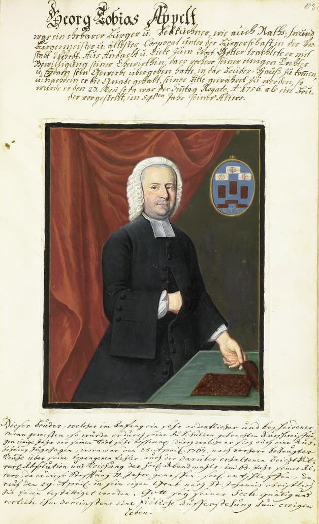 Porträt des Nürnberger Lebküchners Georg Tobias Appelt von 1756 mit Perücke, vor ihm auf dem Tisch ein verzierter Lebkuchen